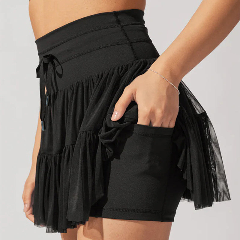 Elegancka spódniczka mini z falbaną i wiązaniem z przodu